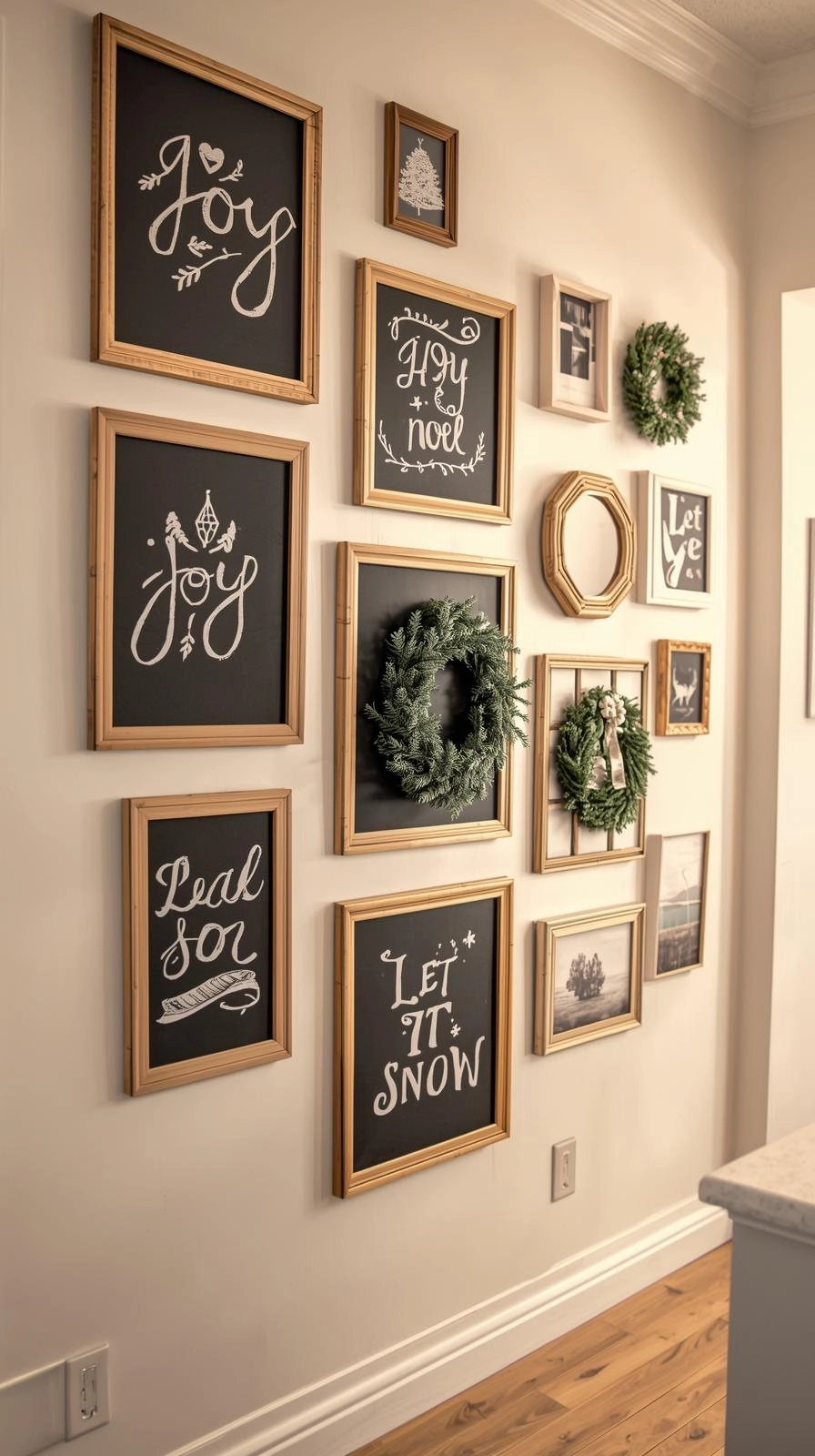 Stylish living room gallery wall decorated with framed Christmas chalkboard art, photos, and wreaths.