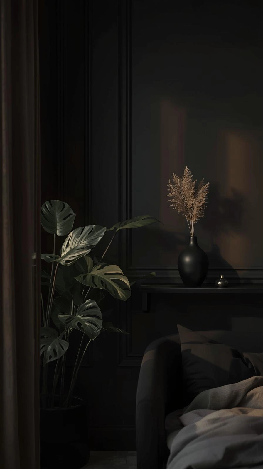 Dark feminine aesthetic room with dark walls, soft lighting, and natural touches like a monstera plant and a dark vase with dried florals.